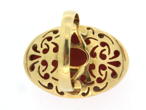 Anello in oro 18 kt con spola di corallo