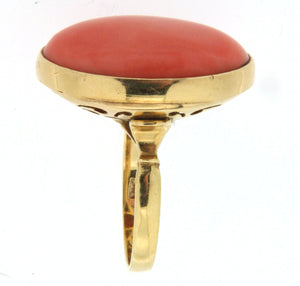Anello in oro 18 kt con spola di corallo