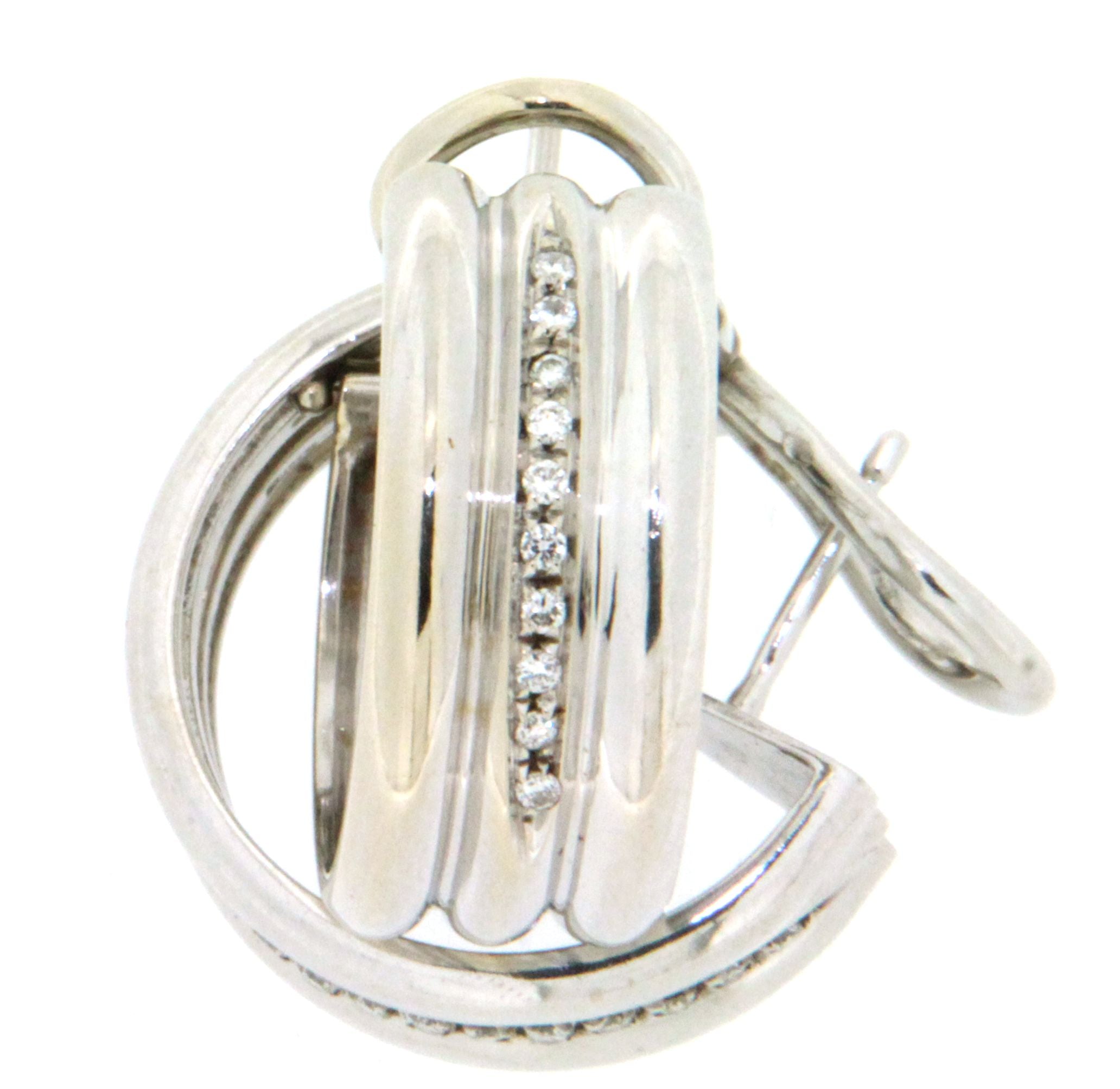 Paio di orecchini a cerchio in oro giallo 18 kt con brillanti. (107)