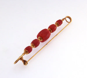 Spilla in oro 18 kt. con coralli
