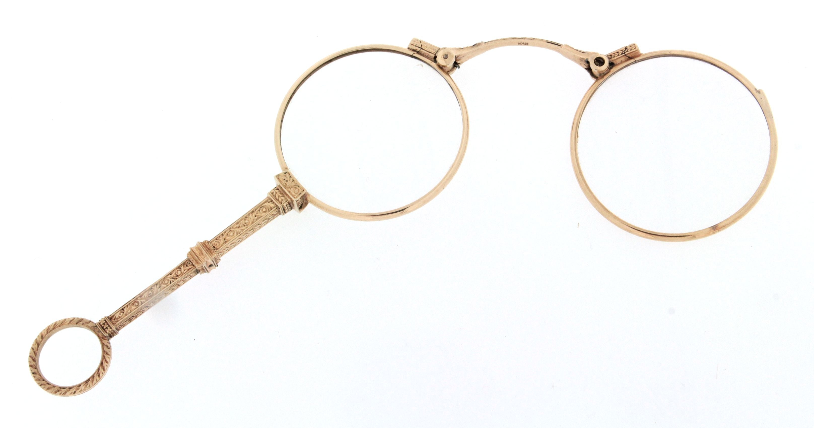 Occhialino pieghevole, lorgnette d'epoca, metà '800, con cornice, maniglia decorativa e anello di base in oro 18 kt. Lenti per lettura.