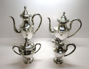 Quattro pezzi teiera lattiera caffettiera zuccheriera in argento 800 stile impero usati.