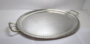 Vassoio in argento 800 di forma ovale con bordo e manici lavorati usato