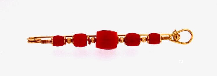 Spilla in oro 18 kt. con coralli