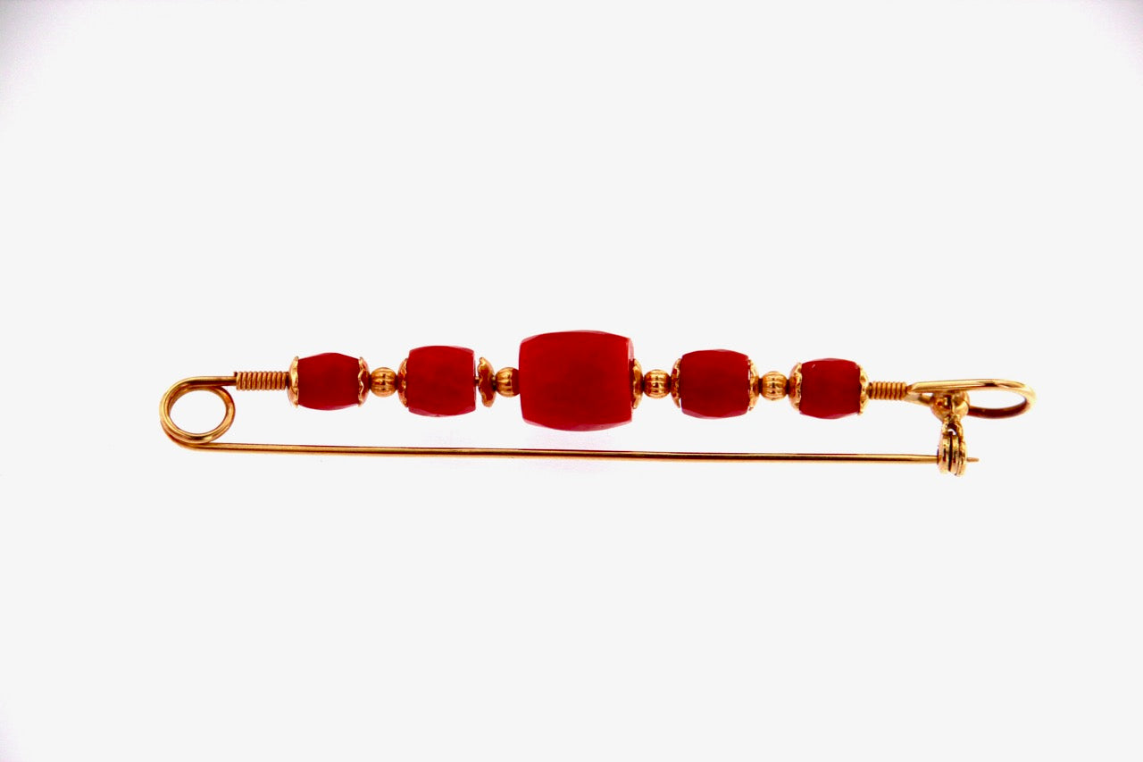 Spilla in oro 18 kt. con coralli
