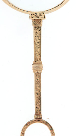 Occhialino pieghevole, lorgnette d'epoca, metà '800, con cornice, maniglia decorativa e anello di base in oro 18 kt. Lenti per lettura.